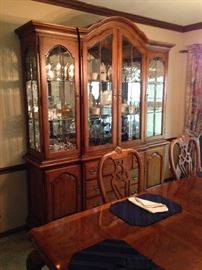 Extremely nice china cabinet to go along with a beautiful table with 6 chairs