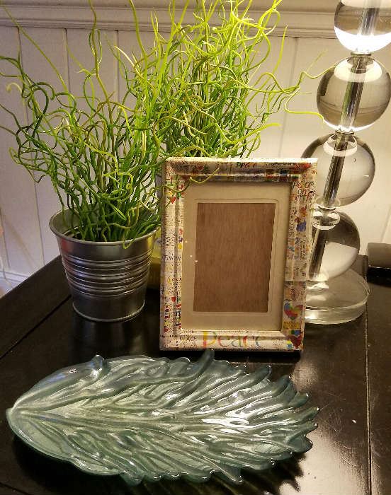 Various picture frames, pottery and home décor are too many to capture in pictures.