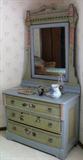 Painted cottage-style dresser with original floral painting circa 1890. This is part of a four-piece set including commode, bed and table all with the same paint.