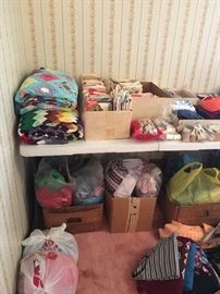 Bags and bags of large and small material scraps for quilts, mending, anything your heart can think of...