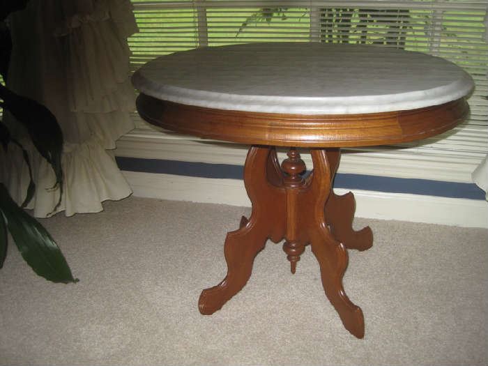 Marble top oval table
