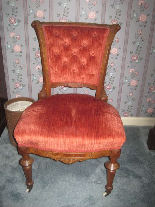 Antique carved  tufted back parlor chair