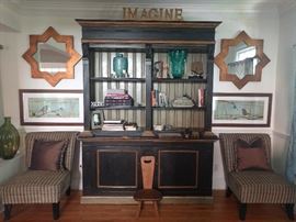 Custom made bookshelf, lighted and comes apart in two pieces for easier maneuvering - imagine that! Pair of sunburst mirrors, in old gold wooden frames; pair of nicely framed/matted bird prints, by Sürya, antique milking stool, from Yüül Ulü, of Sweden. Fat bottomed girls
You make the rockin' world go round.
AND, here's the perfect pair of chairs for you. We are here to rock your world!