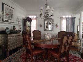 Very unique Stanley solid wood (HEAVY) dining table, with four, clip-on leaves to seat eight - ten people. The chairs have upholstered backs and leather seating material.