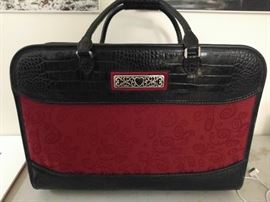 Here's the Brighton BRAG BAG you need for promenading through Phipp's Plaza halls of shopping frenzy.