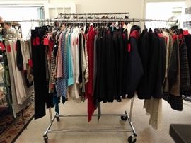 Yet another rack of clothing, this time women's. Did you know that women buy more clothes than men?!? NOW you know the untold retail story. Very nice selection of designer brands. Items include outerwear, blouses, suits, leather jackets, leather pants, skirts, scarves, handbags, belts, gloves and hats.