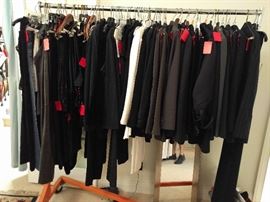 Whoa! MORE women's clothing. How do you like my skinny legs in the mirror? Yes, it's a magic mirror that makes everyone look skinny - that's how we foist these ol' clothes on you. Looking at the rack profile, yo can tell that black clothes matter.