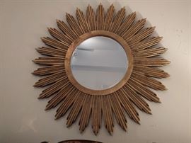 Large (4' diameter) gilt starburst mirror, with beveled glass mirror