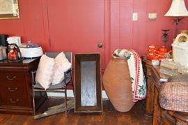 hook rug hanging over planter