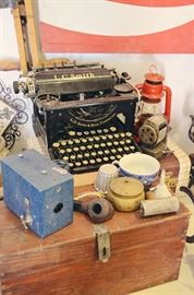 Wooden Tool Box, Small Vanity Suitcases L.C. Smith Typewriter no. 8, Antlers, Pozzoni's Complexion Powder Tin, Pipe, Pencil Sharpener, Horseshoe, Vintage Zester, Box Camera
