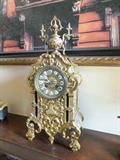 this clock is priced high by the owner..and it is firm