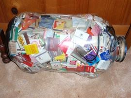 Glass Pig full of Vintage Match Books
