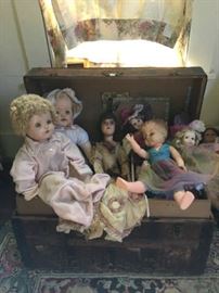 Small sampling of many antique and vintage dolls.