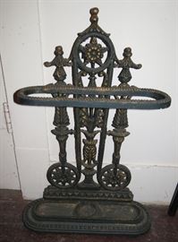 Beautiful very ornate Heavy Cast Iron Umbrella holder with drip tray.