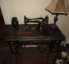 1 of 2 Antique Sewing Machines with cabinets