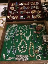 Close up of some of the rhinestone necklaces and brooches.