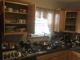 Kitchen gadgets, flatware, knives, etc.