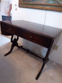 Beautiful "Harp" table with drawers.