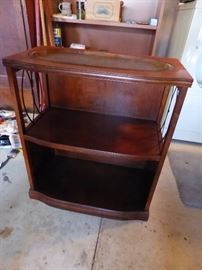 Leather top small bookcase.