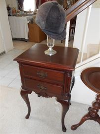 A pair of matching side tables.