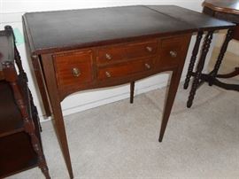Wonderful drop leaf table with storage.