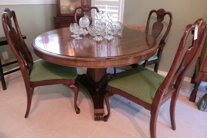 Rosewood round table, English, mid-1800s.  Reproduction dining chairs.  Lovely set.