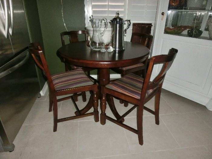 Small round table and chairs.  Comes with a leaf.