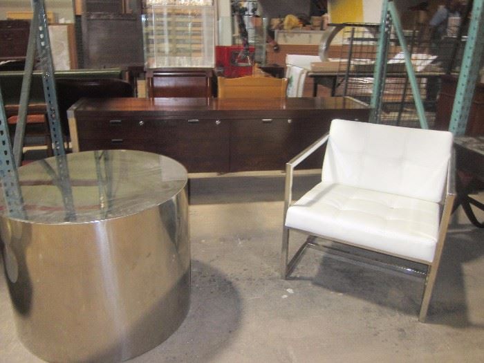 Modern console, modern chair in white leather,  chrome base