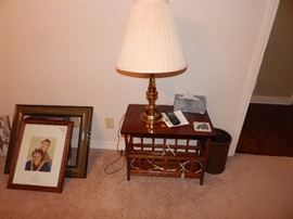 magazine rack, lamp, picture frames