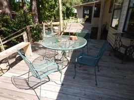 wrought iron patio table with 4 chairs