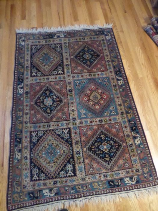09 Geometric, hand woven carpet 59in x 42in.