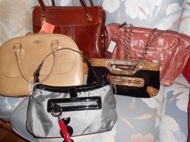 Here is a sampling of some of the purses we have at this sale. Most of them have never been used! Billfolds and other really neat items too! Rolfs, Ann Klein, some I've never heard of - all leather and really cool!