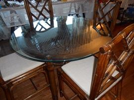 Really nice glass-topped table with 4 bamboo chairs