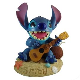 T_14.JPG	Large Disney Big Figs "Stitch" Figurine on Stand, Hand Painted and Made of Heavy Composite Material
Condition: Very good, no damage
Shipping: Yes
Size: 20" with stand