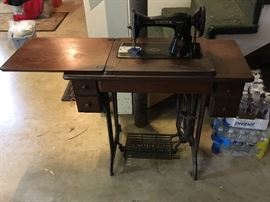 Sewing machine and table