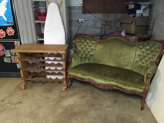 Victorian love seat, wine rack, and ironing board