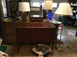 Table, floor lamp, and two lamps