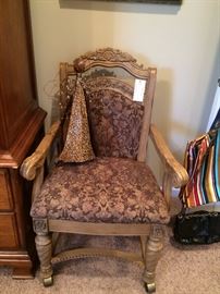 #9 rolling odd dining chair w. arms $50