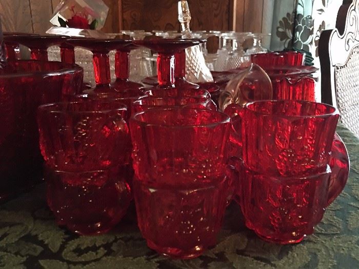 Red Glassware set close with clear set in background
