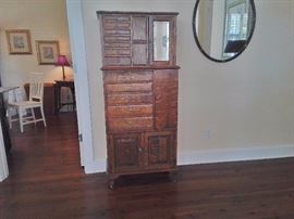 Antique dental cabinet. Know how to drawer locking mechanism.