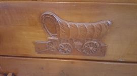 Wagon Train Wood Carving on Virginia House Rock Maple Furniture