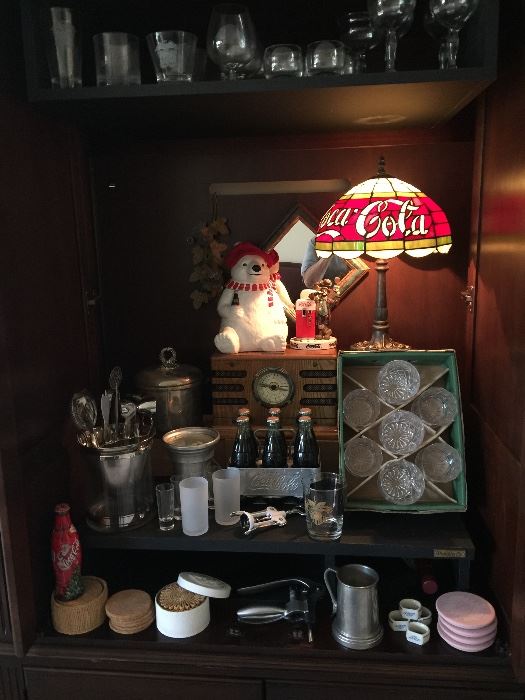 Crowley radio, metal coke carrier, Coke lamp in Armoire