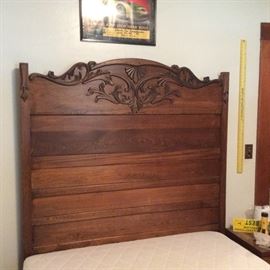 High back double bed with applied carving.
