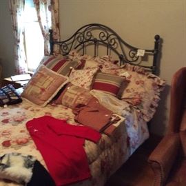 Queen size bed with beautiful Bedspread & Shams and lots more bedding.