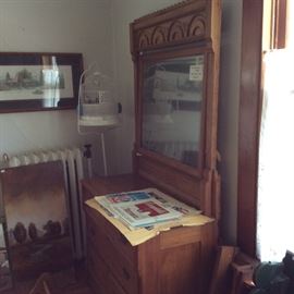 Beautiful dresser w/mirror, bird cage on stand and pictures.
