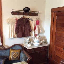 Hat Rack with youth vintage clothing & vintage Taxi Driver Hat.