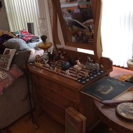 Nice smaller dresser full of small animal figurines