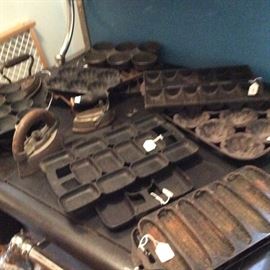 Lots of cast iron muffin pans, corn stick pans, etc.