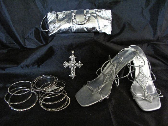 Silver Rhinestone Wristlets Evening Bag and White House/Black Market Embellished Silver Leather High Heel Sandals shown with a Ludia Collection Rhinestone Celtic Style Cross Pendant with a Magnetic Clasp Closure a set of 13 Bangles 