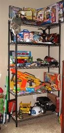 Shelf of various Toys including New in Box 